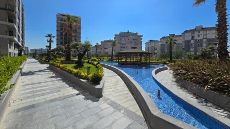 Бейликдюзю: Новая 2+1 на 1 этаже в ЖК Yaşam Marina у моря!