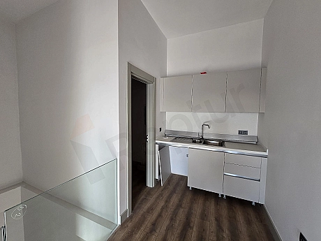 Фотография кухни открытой планировки.