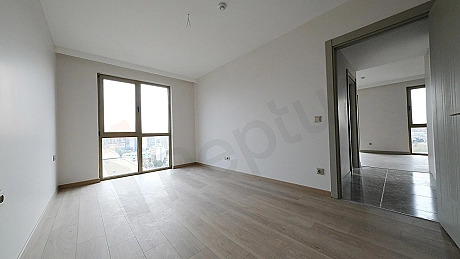 Фотография спальни непродаваемой мебелированной квартиры 2+1 в Зейтинбурну.