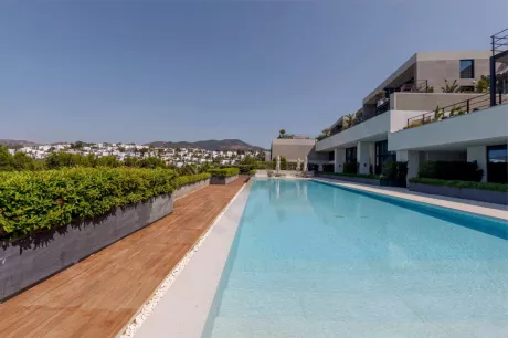 Недвижимость в Бодруме: дом премиум-класса с тремя спальнями и частным пляжем